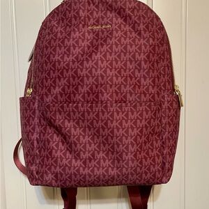 Michael Kors Signature MK Backpack in Deep Burgundy with Gold Hardware